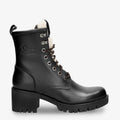 Tibi botas de piel con forro interior de pelo. negro