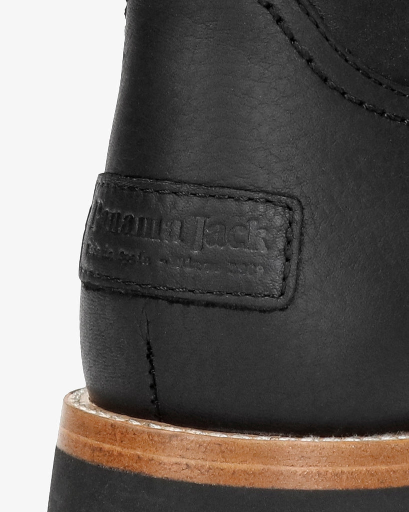 Bambina botas de piel con forro interior de pelo. negro