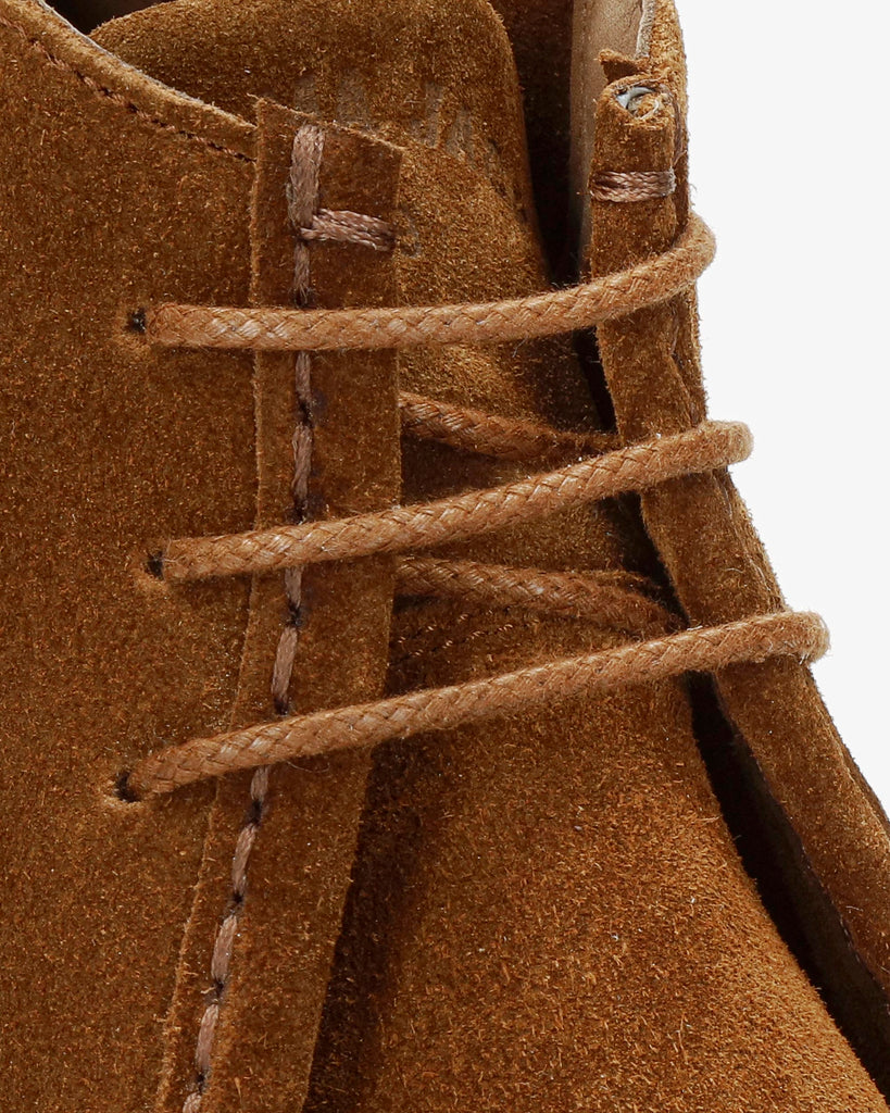 Beker botín de piel con forro interior de piel. cuero