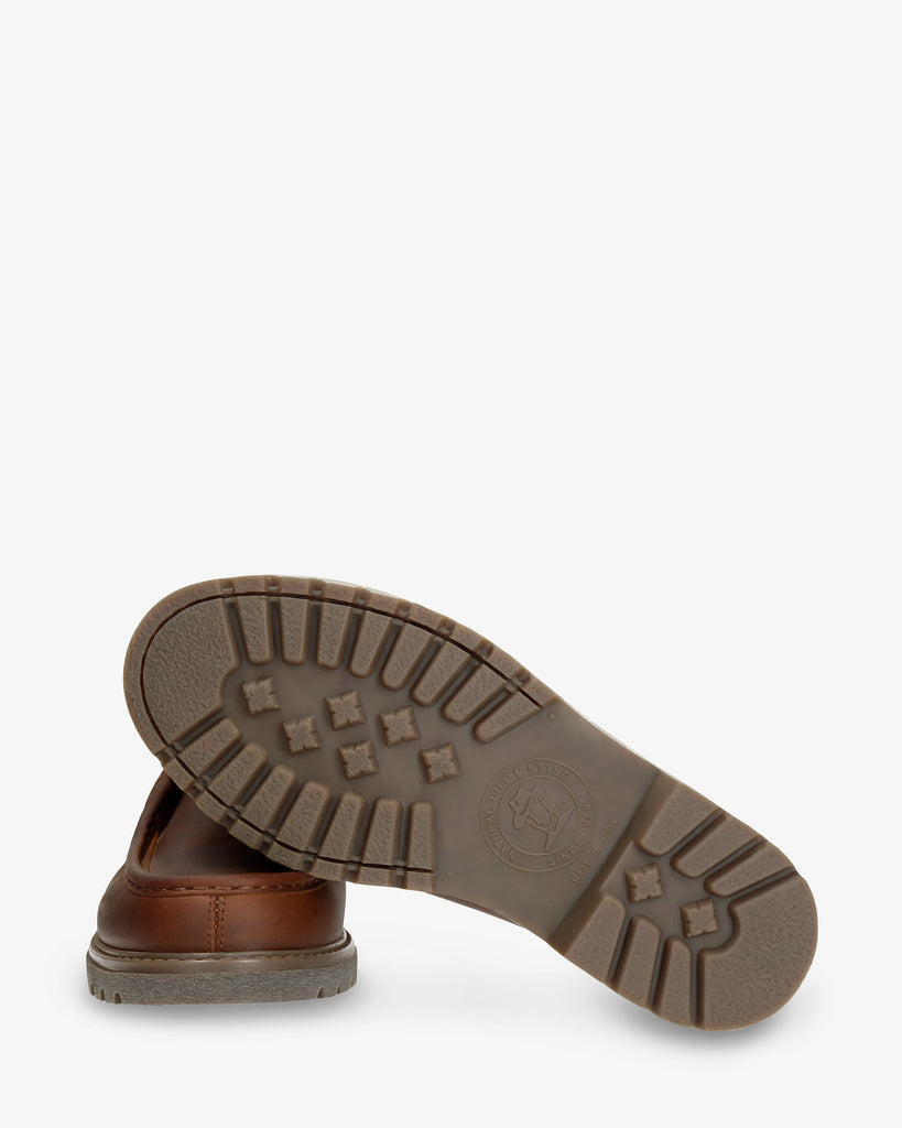 Beker botín de piel con forro interior de piel. cuero