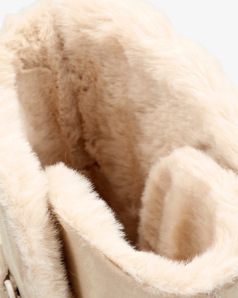 Felia Trav botas de piel con forro interior de pelo. crudo