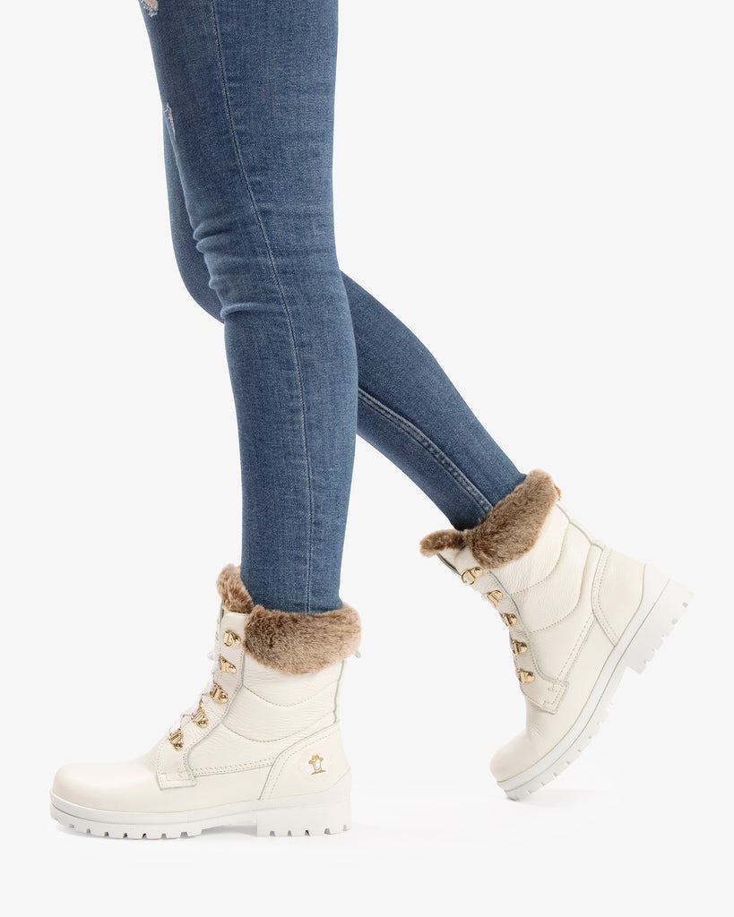 Tuscani botas de piel con forro interior de pelo. blanco